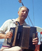 Capt. Andy playing accordion on Adria in 1970
