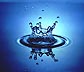 [water splash by water drop impact on layer of water]