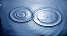 [ripples on water collide and create interactive result]