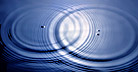 [ripples on water collide and create interactive result]