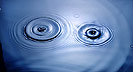 [ripples on water collide and create interactive result]