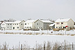 [houses by frozen pond]
