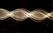 [time photo of vibrating string]